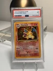 LOOK!! CHARIZARD 1999 POKEMON BASE SET UNLIMITED HOLO #4 PSA 7