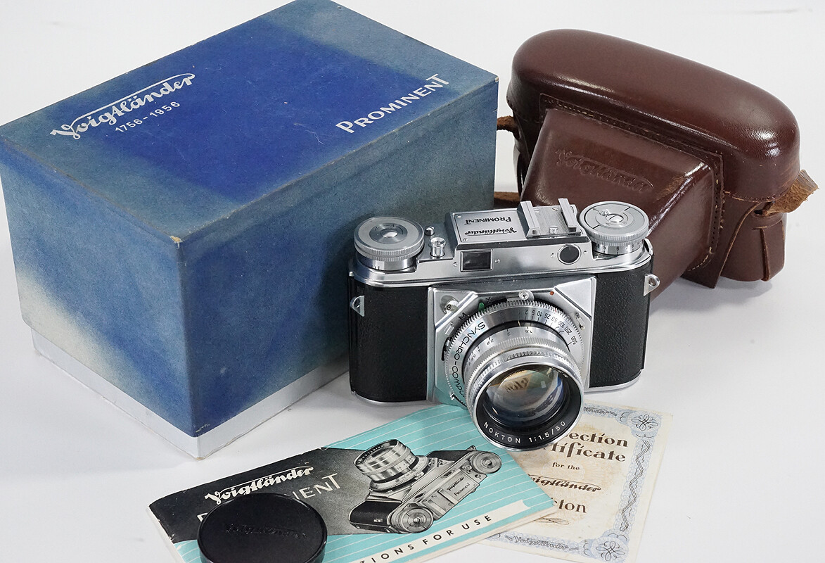VOIGTLANDER PROMINENT, 50/1.5 NOKTON, FADED BOX, NEAR MINT VOIGTLANDER PROMINENT, 50/1.5 NOKTON, FADED BOX, NEAR MINT