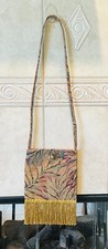 Vintage handmade tapestry bag with gold thread fringe. Pink satin interior