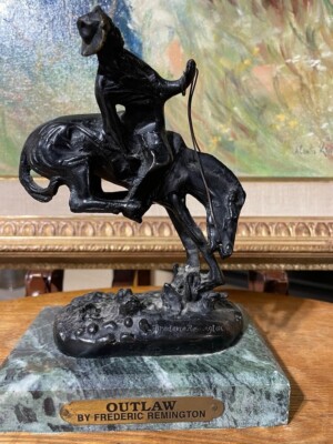 Outlaw Western Cowboy Bronze Statue by Frederic Remington on Green