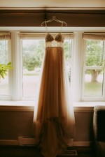 Stella York wedding dress size 2, blush pink under layer.