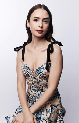 Lily Collins Dress Sitting Chair 11x17 Poster_11x17