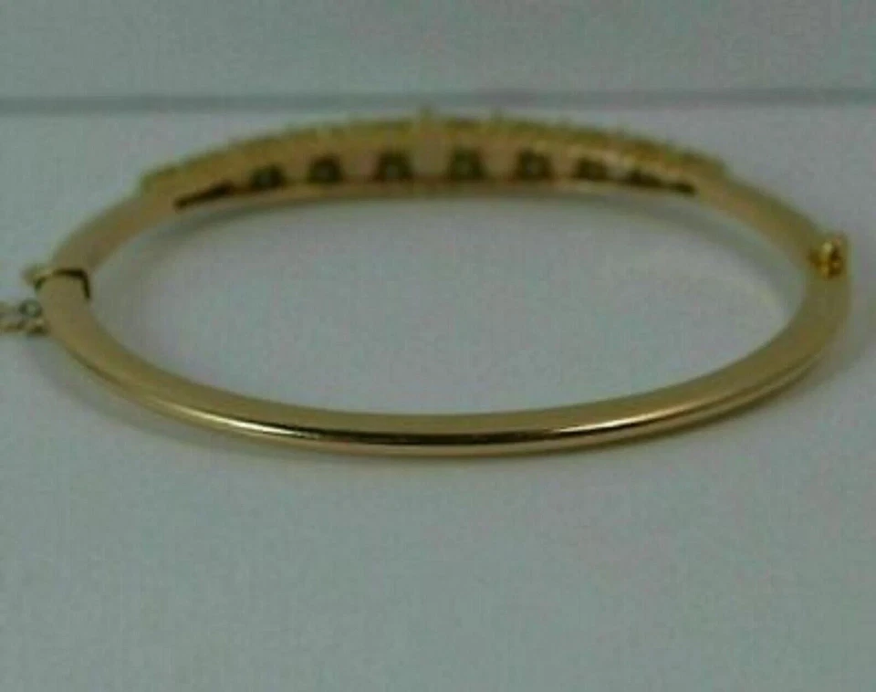 Brazalete brazalete para mujer de ópalo de fuego simulado de corte ovalado de 6 quilates enchapado en oro amarillo de 14 quilates Foto 2 de 4