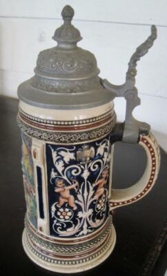 1908 German 9'' Beer Stein with A Raised Relief Romantic Couple & Cherubs Panels