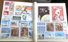 Briefmarken Album mit über 600 Briefmarken aus aller Welt .