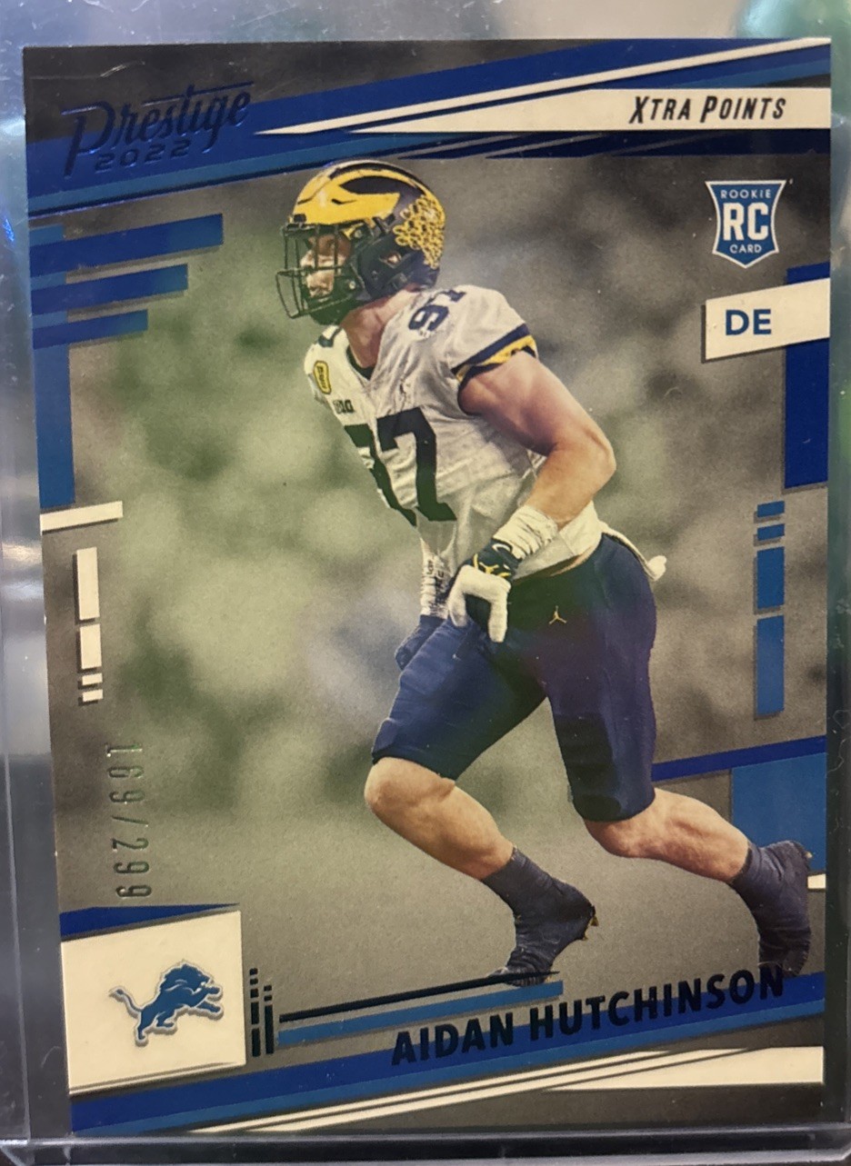 2022 Panini Prestige - Rookies Aidan Hutchinson #312 Xtra Points Blue /299 (RC)