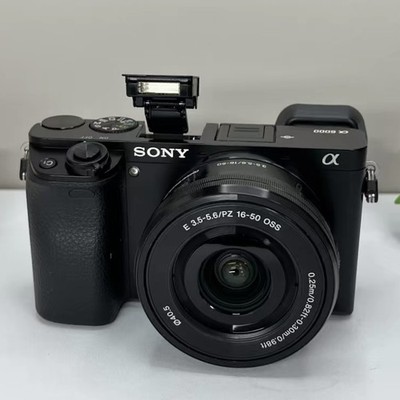 Sony Alpha a6000 24.3MP Mirrorless Digital Camera w/ 16-50mm OSS Lens English