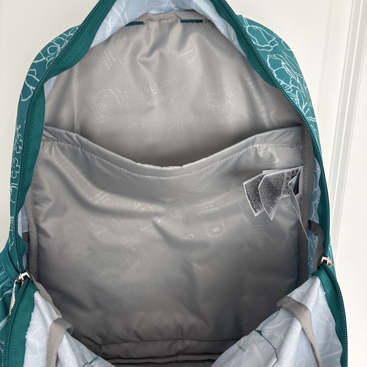 JanSport Delightful Daisies Green Floral Cross Town Plus