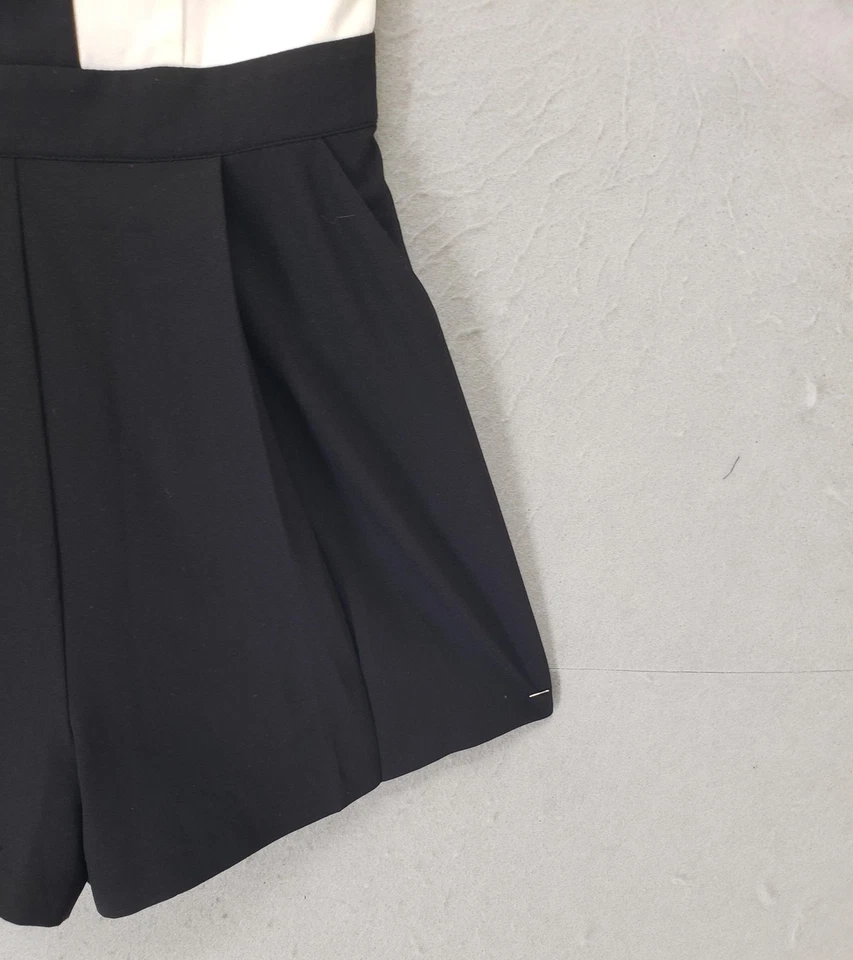 Pantalones cortos elegantes Aqua Romper para mujer XS negro blanco manga con volantes cuello en V bloques de colores Foto 4 de 4