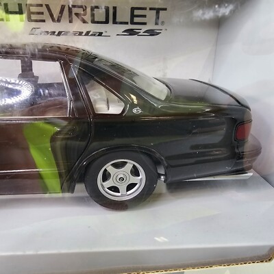 UT Models 1996 Chevy Impala SS Black Cherry 1:18 Diecast Jon