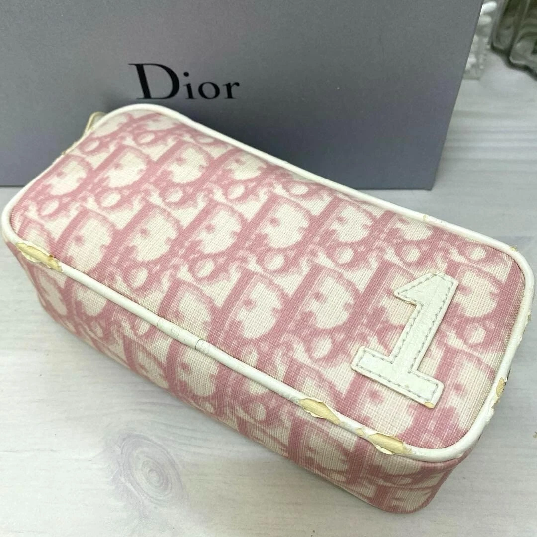 Pochette trotteur Christian Dior rose fermeture éclair sans accessoires occasion