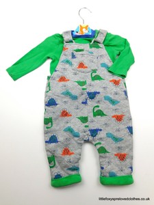 green dungarees baby