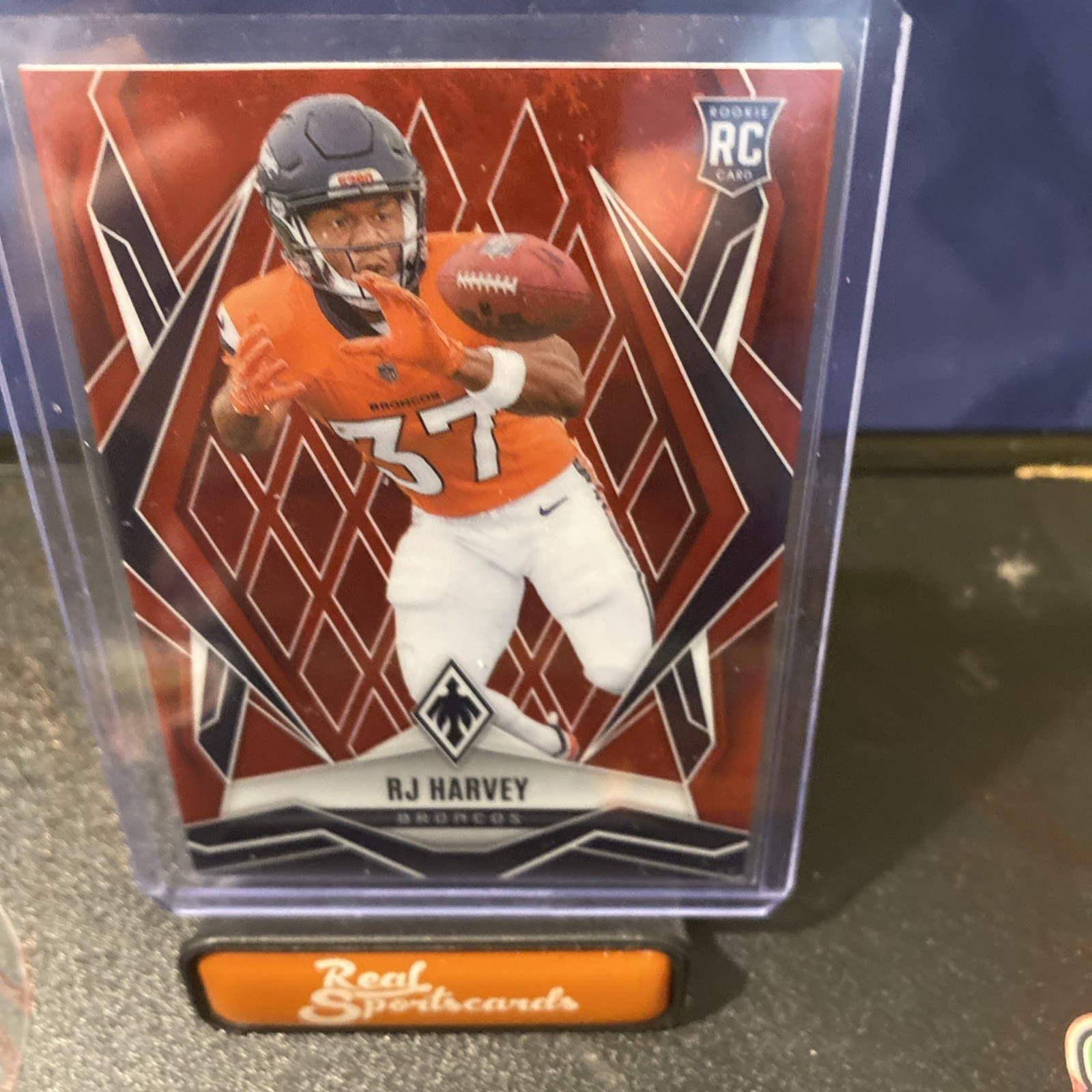 2025 Panini Phoenix - Rookies RJ Harvey #176 Red Winter /399 (RC)