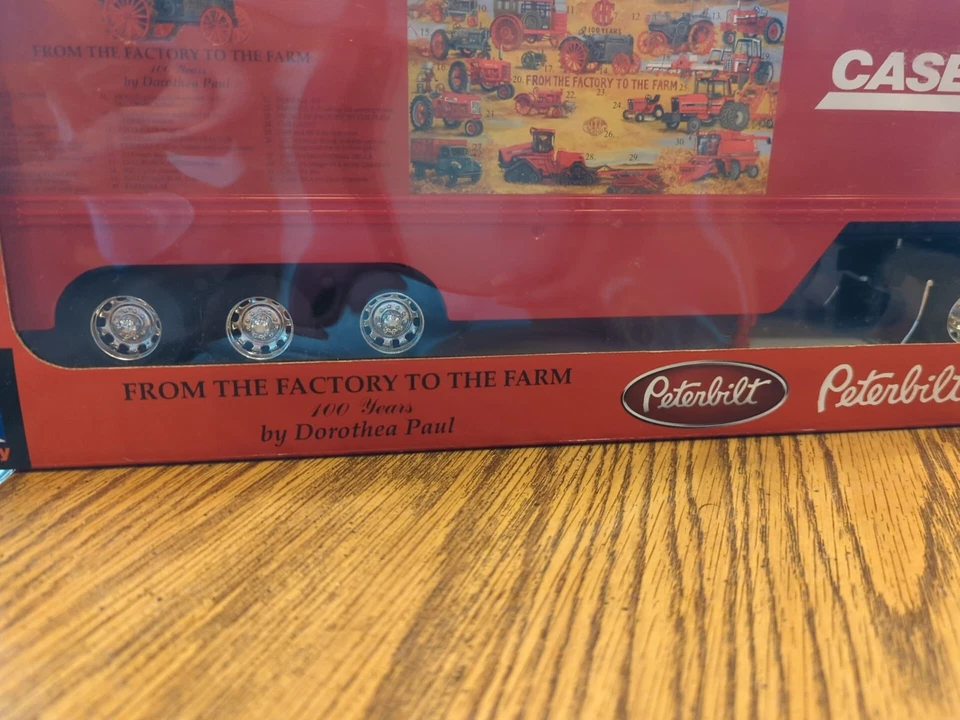 New Ray Peterbilt 387 Case IH From the factory to the farm 100 years Truck 1:32 - Image 4 of 4