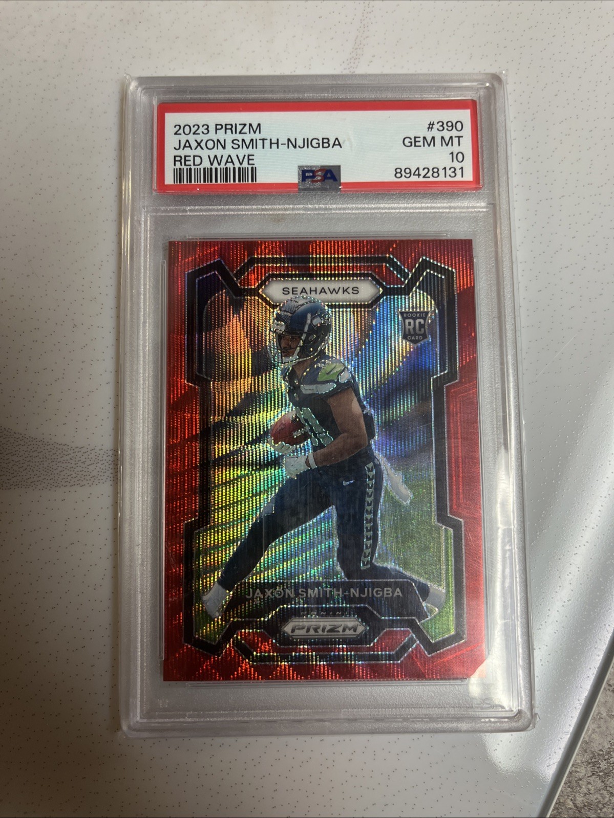 2023 Panini Prizm - Rookies Jaxon Smith-Njigba #390 Red Wave Prizm /149 (RC)