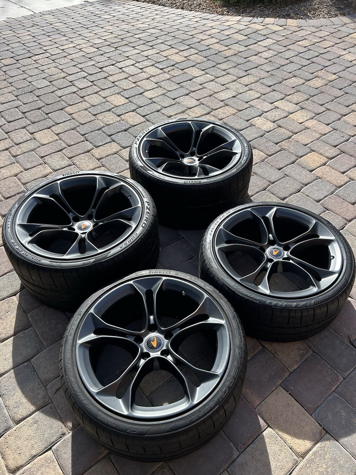 McLaren 720 new factory rims/tires   50 miles.   No chips or curbs ever.  