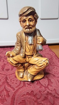 Ceramic Man Figurine With Bag Over Shoulder