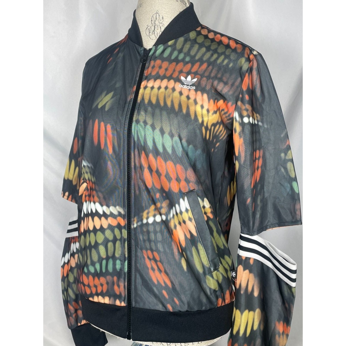 Rita Ora x Adidas Originals Trapeze Cut Out Track Jacket Top Rita Ora x Adidas Originals Trapeze Cut Out Track Jacket Top
