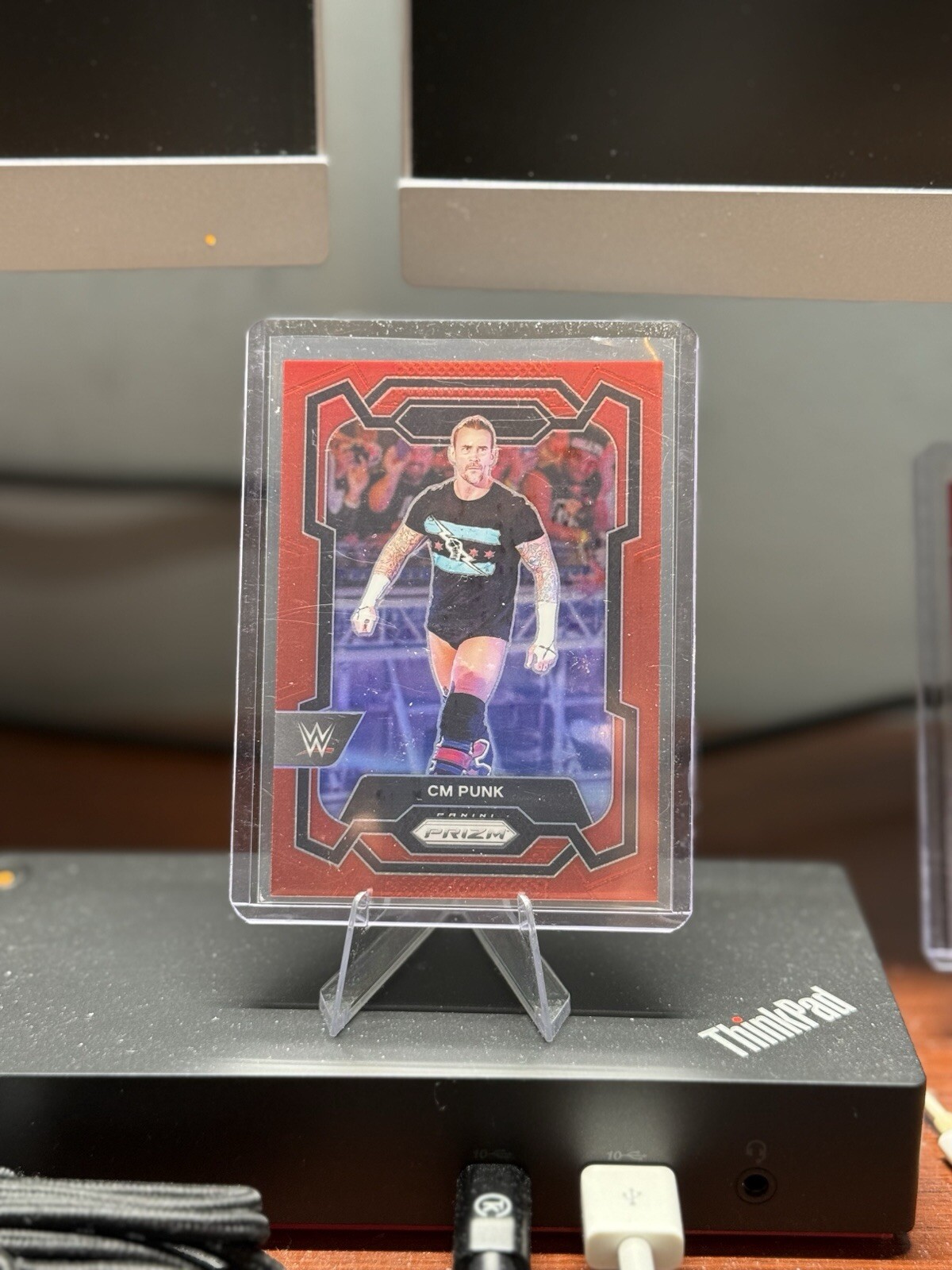 2024 Panini Prizm WWE CM Punk #122 Red /299