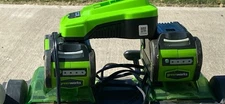 Greenworks Lawn Mower And Weed Trimmer W/ 2 Batteries And Charger