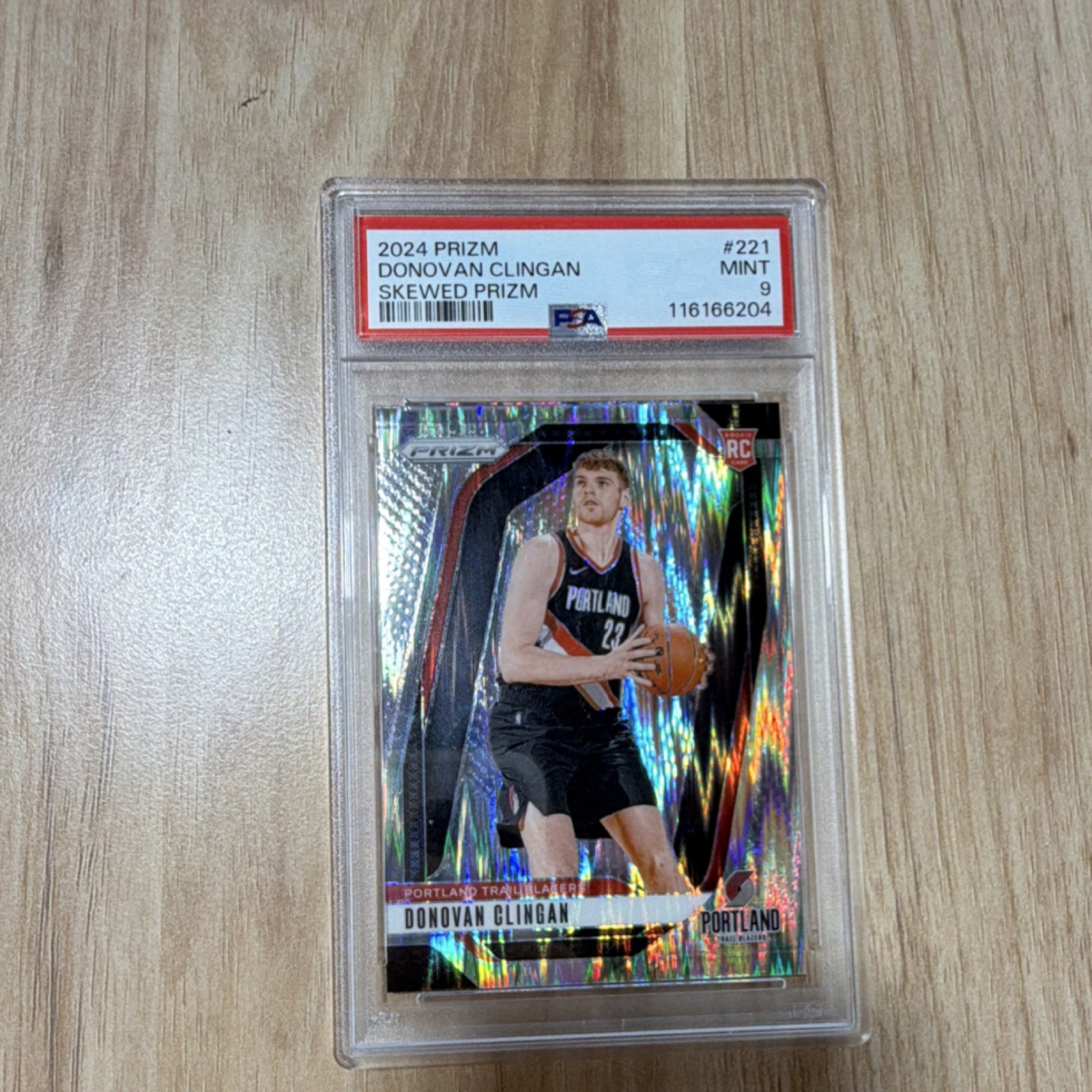 2024-25 Panini Prizm Donovan Clingan #221 Skewed Prizm /249 Rookie PSA 9