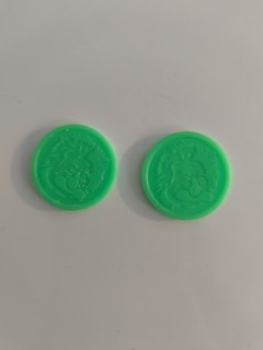 Münzen aus Kunststoff mit Albert Einstein aufgedruckt witzig grün