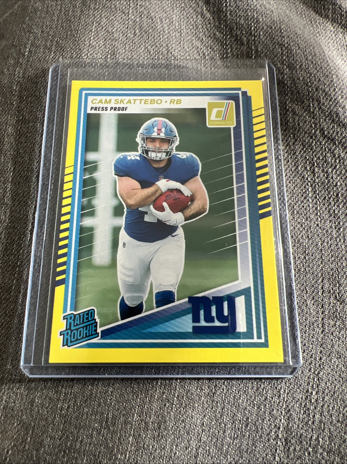 2025 Panini Donruss - Rated Rookie Cam Skattebo #302 Press Proof Yellow (RC)