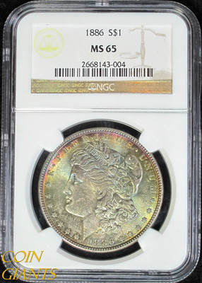 1886 Morgan Silver Dollar MS65 NGC Rainbow Toned GEM Philadelphia