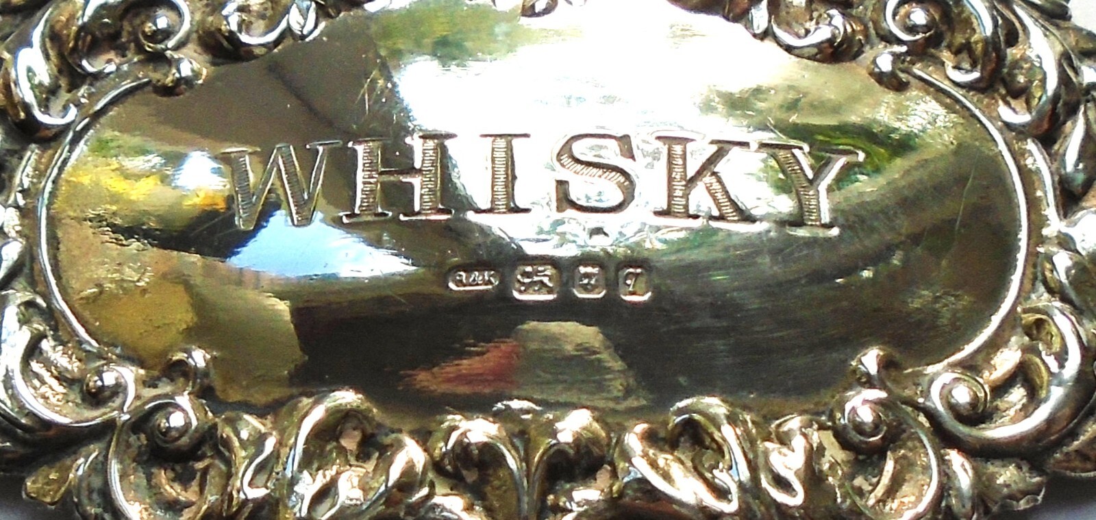 VINTAGE STERLING SILVER WHISKY DECANTER / BOTTLE LABEL. HALLMARKED 1971