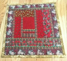 Quilted table topper red and.green, 14.5 x 13.5, ribbon trim, decorative stitch