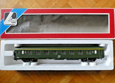 voiture SNCF DEV AO courte A8 1ère classe marquage corail Lima HO ref ? - Photo 1/4