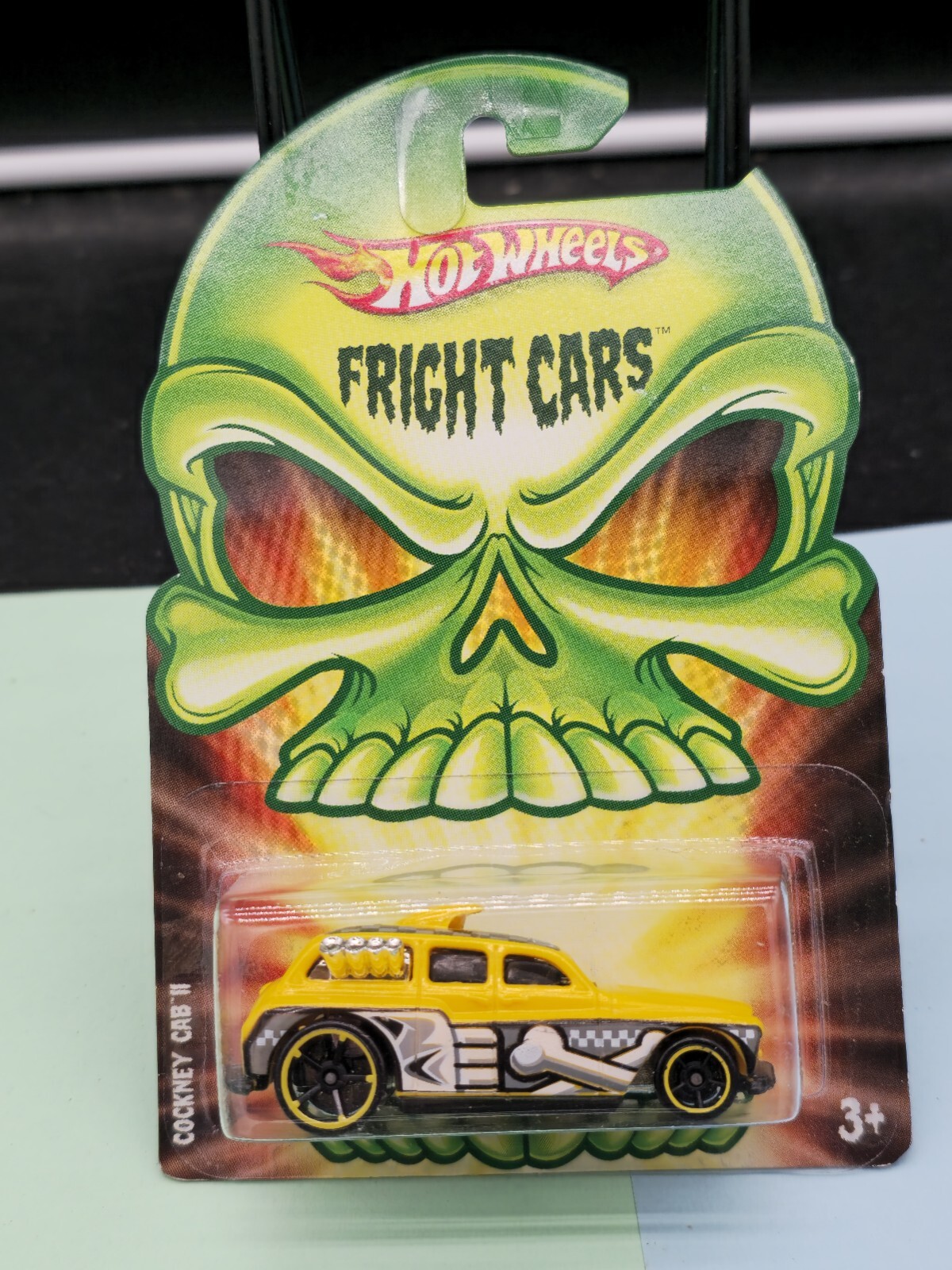 2009 Hot Wheels Fright Cars Series COCKNEY CAB II Yellow w/Black OH5 Spokes
