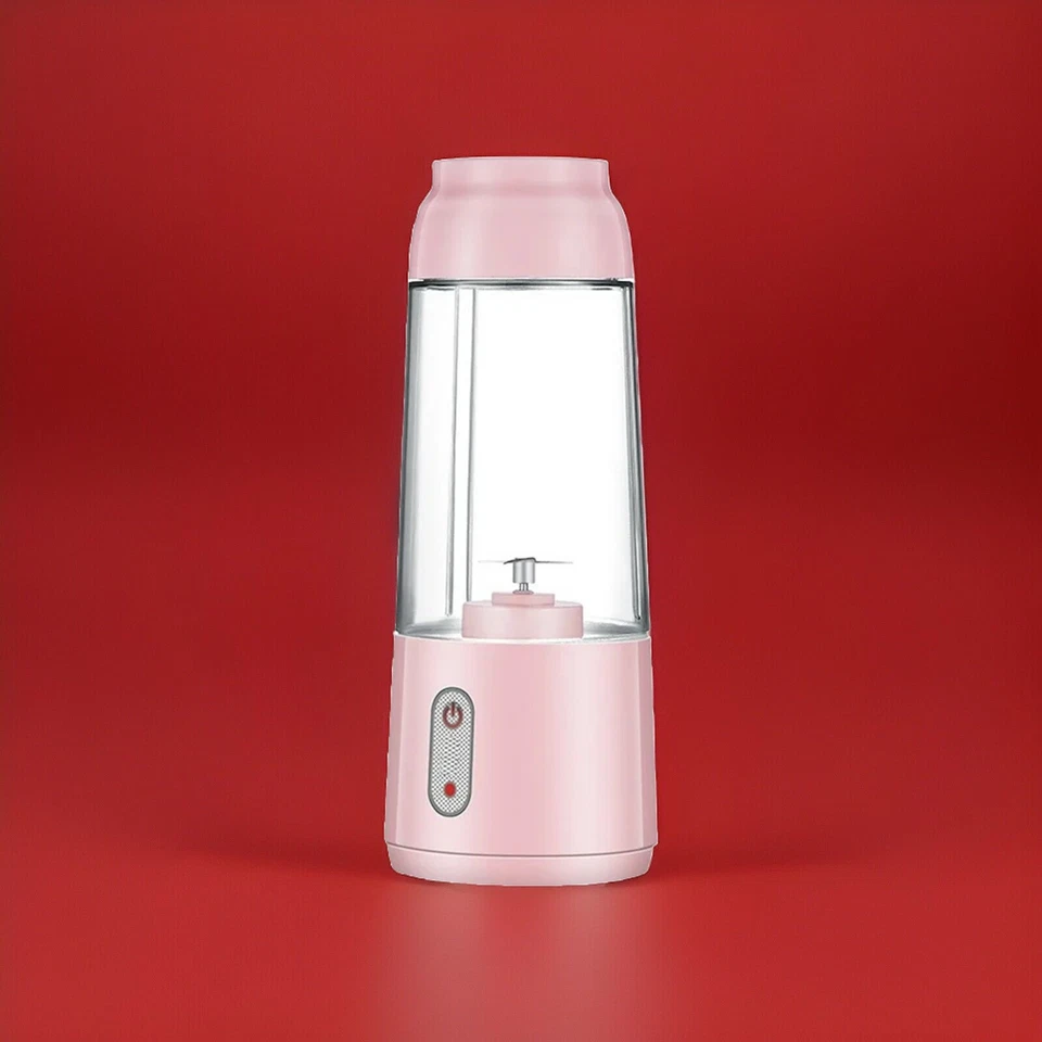 Exprimidor eléctrico portátil Foto 2 de 3