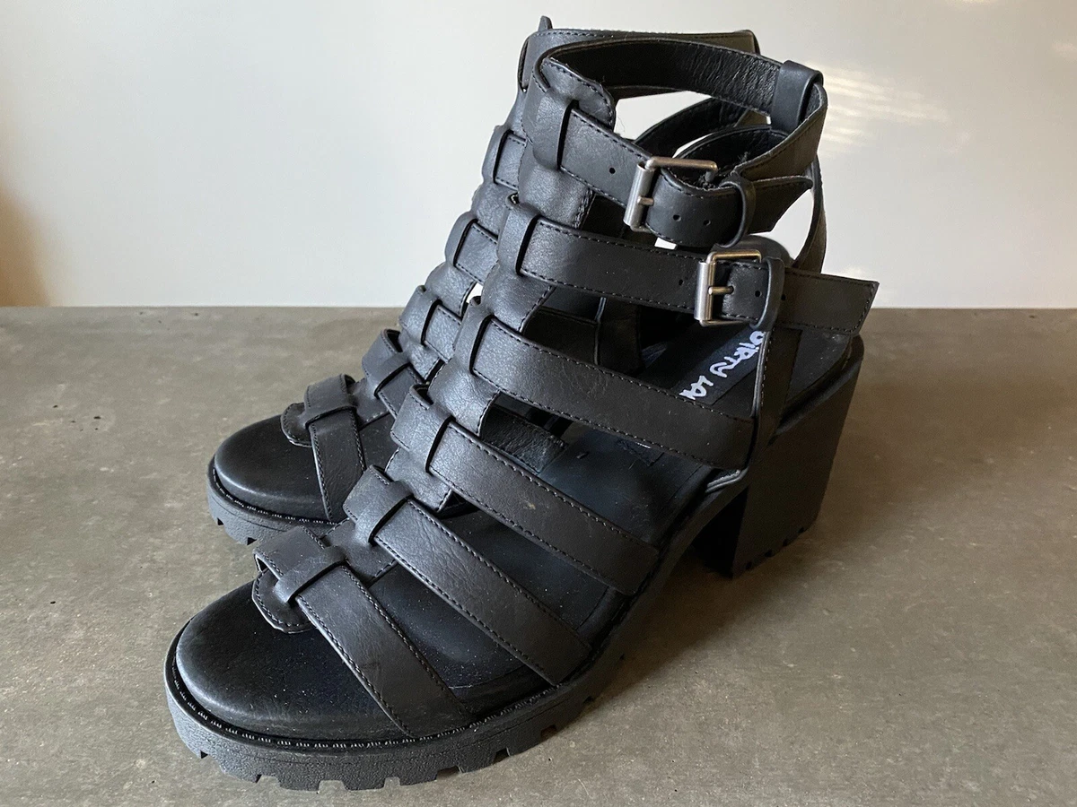 Caged clearance platform heels