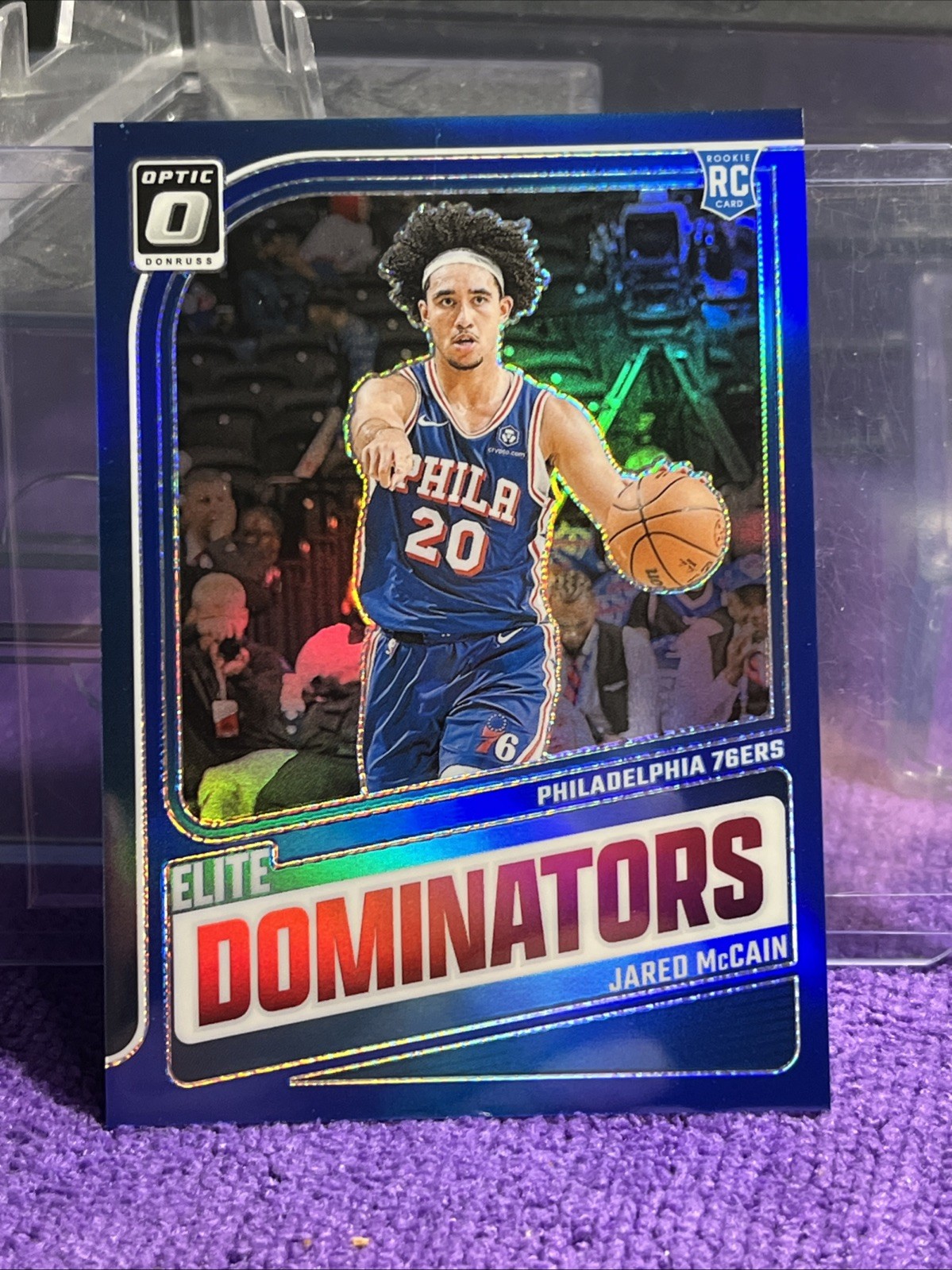 2024-25 Panini Donruss Optic Jared McCain Elite Dominators Blue 49/49 RC 76ers