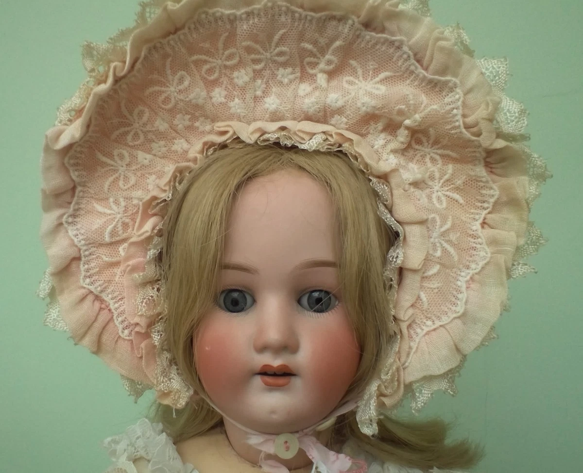 A Heubach Koppelsdorf bisque head doll, impressed '342.7', with brown wig, closing blue ey