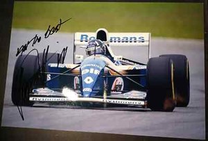 damon hill moves forward during race looking for top finish signed 12x8 photo