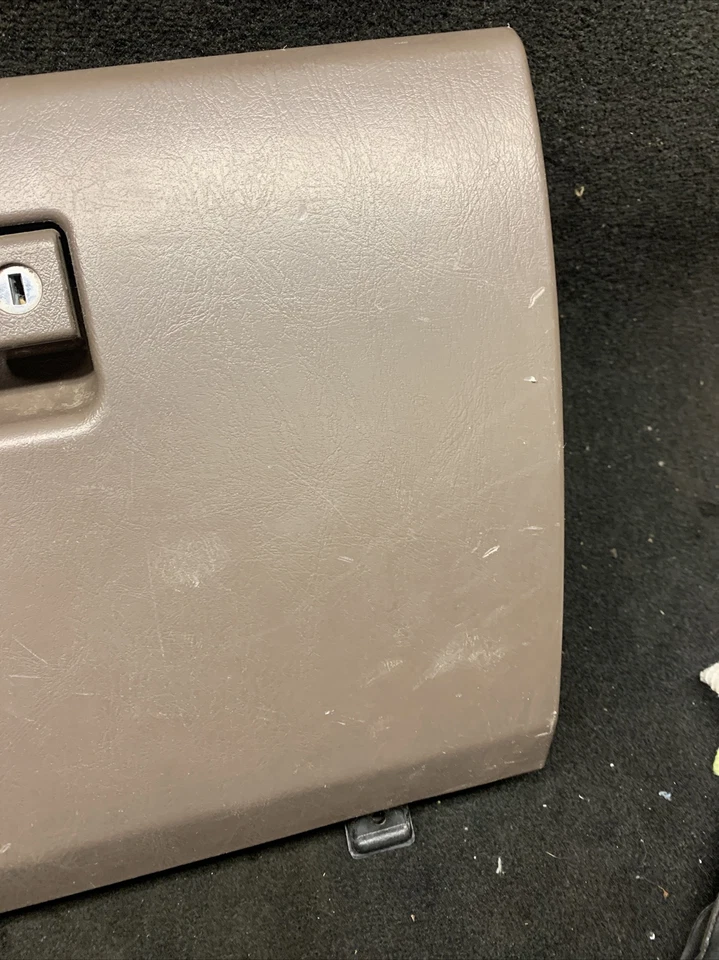 Toyota 4Runner 1996-2002 guantera puerta/montaje marrón OEM Foto 3 de 4