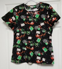 SCRUBSTAR SCRUB TOP W/2 POCKET. BLACK W/MULTICOLORED CHRISTMAS DESIGN. SIZE: XL
