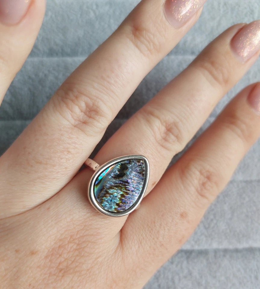 Sehr schöner Ring mit echtem Galiotis, Edelstahl. Größe 17,7