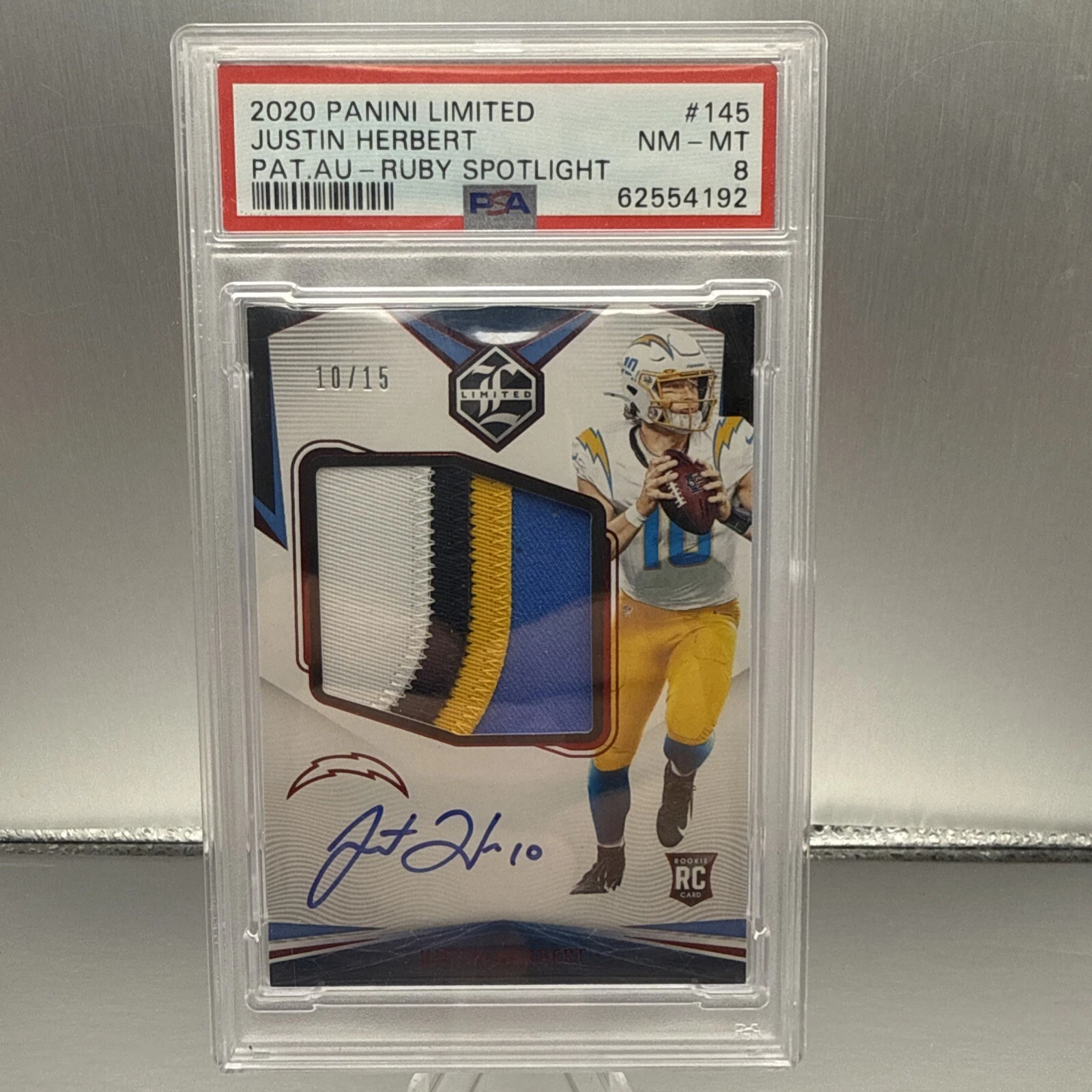 Justin Herbert Panini Limited #145 Patch Autograph-Ruby Spotlight