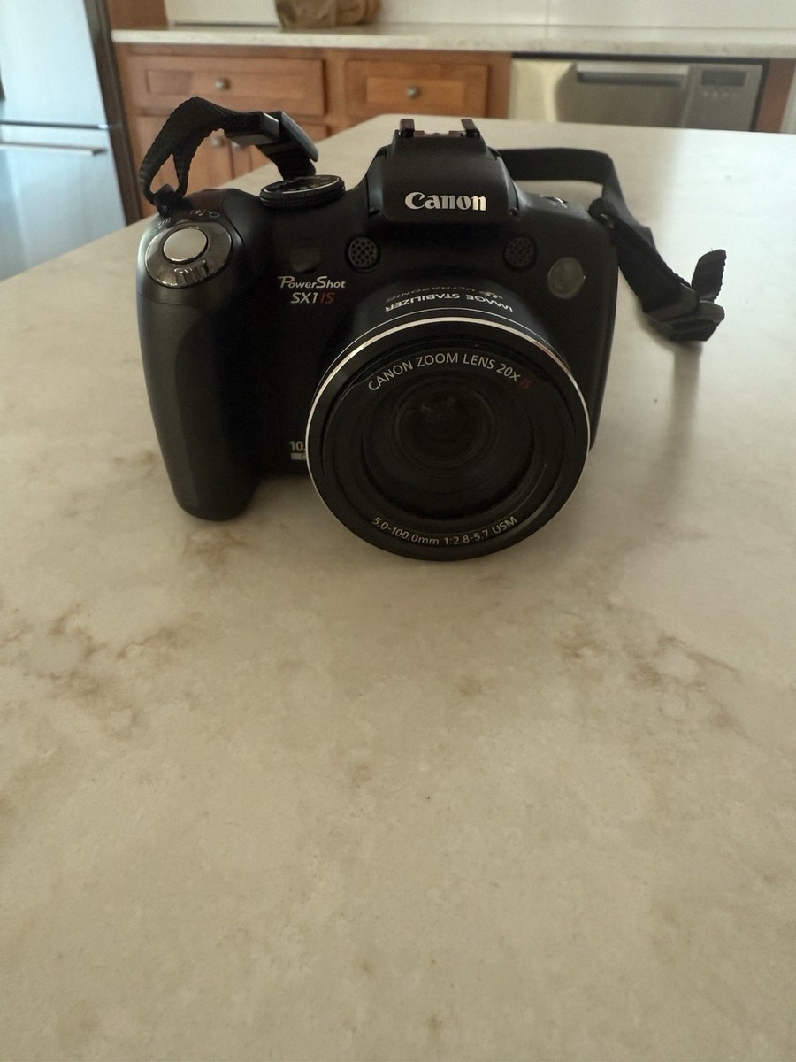 キャノン【Canon PowerShot SX1 is】 美品 特売セール開催中 Canon PowerShot SX1 IS 10.0MP Digital Camera - Black for