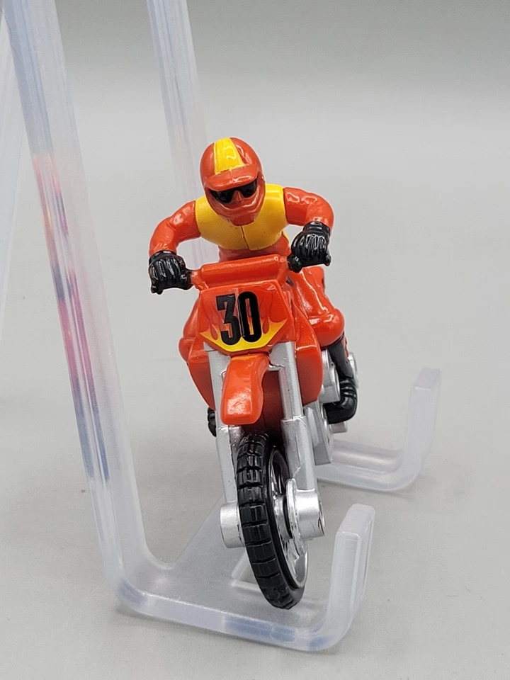 Motocicleta de fricción Hot Wheels con Stunt Rider rojo amarillo Foto 2 de 4