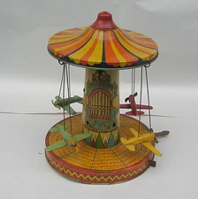 VINTAGE WIND UP TIN LITHO AIRPLANE RIDE TOY - NEEDS SOME WORK 