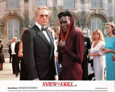 A View To A Kill Christopher Walken in tuxedo & Grace Jones 8x10 inch photo