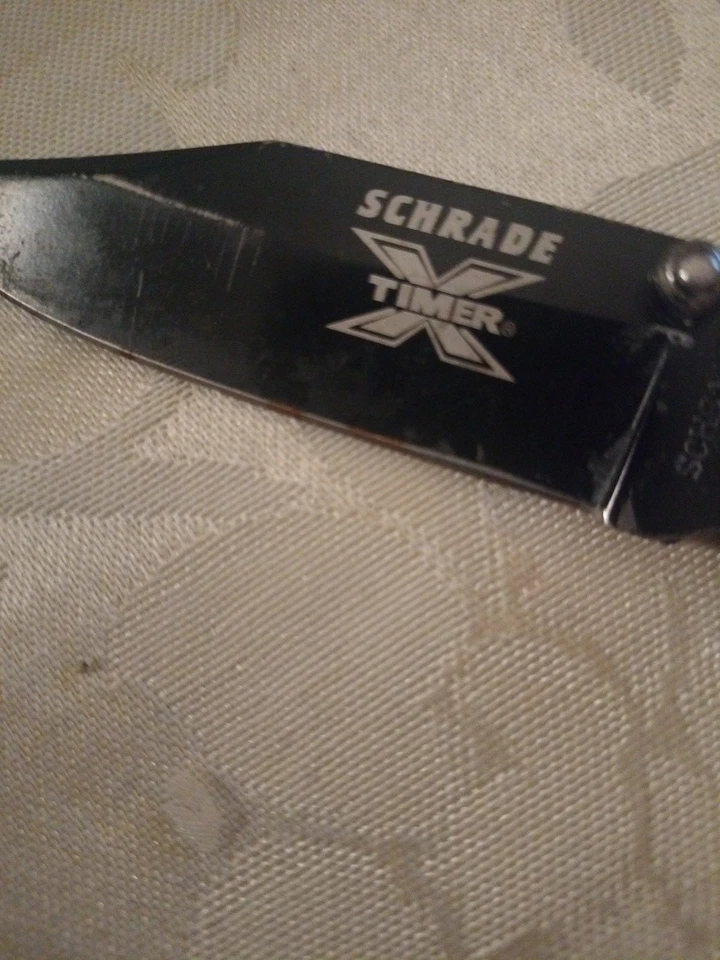 Cuchillo de bolsillo SCHRADE X-Timer B, una sola hoja con bloqueo con mango de polímero Foto 4 de 4