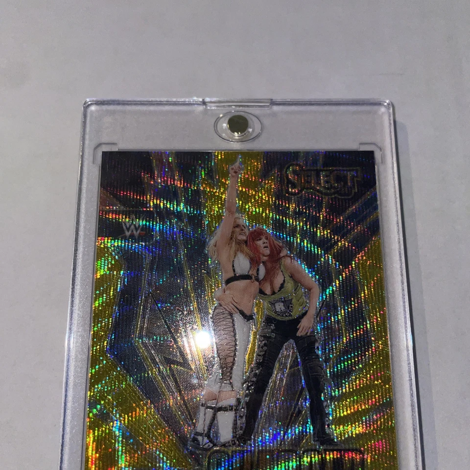 2024 Panini Select WWE #10 Trish Stratus Turbo charged GOLD Wave Prizm /10 - Image 2 of 4
