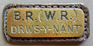 BR(W) brass cash bag label "Drws y Nant" station on Ruabon to Barmouth line