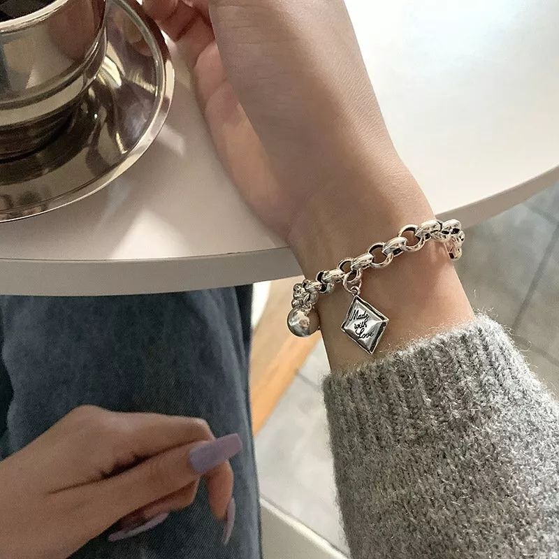 Silver charm 2024 bracelets for women