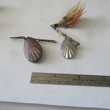 FISHING LURE UNKNOWN FLUTED SPOON ON A 2¼" WIRE  & FEATHER HOOK  AND BONUS SPOON
